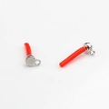 Detailed view of mini red cylindrical resin charms with silver-plated alloy loops - Silver