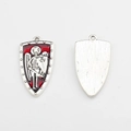 Detail view of dark style shield pendants with red enamel and silver angel relief for DIY - Red & Silver