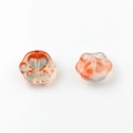 Detailed close-up of crystal glass cat paw charms with orange-pink gradient for DIY jewelry - Orange Green