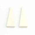 Macro detail of cream white triangular wooden pendants for DIY earring jewelry crafting - White