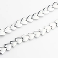 Detailed view of silver heart-shaped hematite beads for DIY jewelry making and crafts - Silver