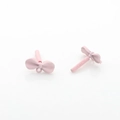 Close-up of pink bow alloy earring components with matte finish and connector loops - Pink