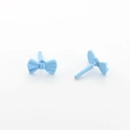 Close-up of light blue matte bow stud earrings showing front and side details - Blue