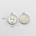 Macro shot of silver alloy coin charms showing Queen portrait and 18mm diameter measurement - Silver Dos Pesos Style (04)