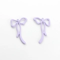 Detail shot of lavender matte alloy bow pendants with rings for DIY jewelry making - Purple