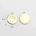 Vue recto-verso d'un pendentif pièce vintage en alliage doré 21mm avec relief féminin - Portrait Féminin République Française (05)