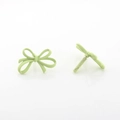 Detail view of matte light green bow stud earrings with alloy spray paint finish - Smooth Large Style / Green