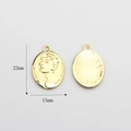 Detail of 22x15mm gold oval pendant with Hepburn relief and sunburst texture back - Audrey Hepburn Style Portrait (03)