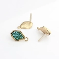 Detail of geometric gold alloy earring studs with turquoise bead inlay for DIY jewelry - Blue