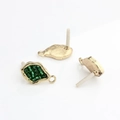 Detail of three gold leaf-shaped earring studs with green beads and back hanging loops - Green