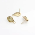Detailed view of gold plated geometric jewelry components with seed beads for DIY earrings - White