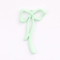 Mint green painted bow pendant with hanging loop for DIY jewelry making and craft projects - Grass Green