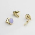 Detailed view of golden DIY earring converters with lavender round tray and spring clips - 10mm / Gold-Purple