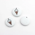 Detail of round wooden DIY charms with cute ice cream cone patterns and pre-drilled holes - Ice Cream