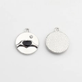 Front and back detail of alloy heart charm with black inlay and crystal accent - Silver