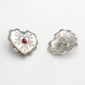 Detailed view of vintage silver heart alloy buttons with red stone and lace edges - Bean Paste Red