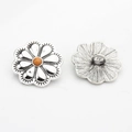 Detail of vintage flower concho with orange center bead and silver shank backing - Orange