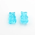 Macro shot of two transparent light blue resin gummy bear beads for DIY jewelry making - Large Style / Blue