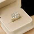 Silver flower ring featuring cat eye petals and micro-pave zircons in a jewelry box - Palladium White Cat's Eye Open Ring / Palladium White K Style