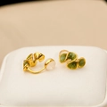 Chic gold leaf-shaped clip-on earrings with green enamel and white pearl details - Holographic Green