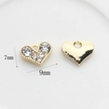 Vue macro de breloques en forme de cœur doré avec strass pour création de bijoux DIY - Style Cœur Pavé Doré (02) / 9mmx7mm