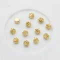 Golden spherical flower stamen alloy charms for DIY jewelry making on white tray - Gold