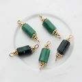 Macro view of five green natural stone cylinder pendants with gold plated end caps - 22*6mm-24*7mm / Emerald
