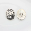 Macro detail of vintage silver oval flower button with shank back for jewelry DIY - Antique Silver