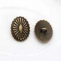 Detailed macro view of vintage bronze oval flower buttons with shank back for DIY crafts - Antique Bronze