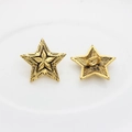 Detailed view showing both sides of a vintage star-shaped metal button in antique gold - Antique Gold