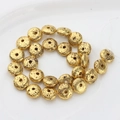 Macro view of gold plated disk-shaped lava stone beads with porous texture for DIY jewelry - 13*6mm 1pc / Gold