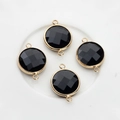 Detailed view of 16mm faceted black crystal connectors with golden copper frame edges - Black