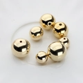 Detailed view of polished gold plated CCB beads in various sizes for DIY jewelry making - 10mm / 14K Gold