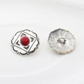 Detail of vintage silver alloy floral buttons with red oval faux stone and back loop - Red