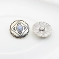 Close-up of vintage silver alloy buttons with white stone center showing front and back - White