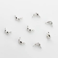 Macro detail of silver folding crimp bead covers and jewelry wire connectors for DIY - Silver