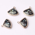 Macro shot of fan-shaped glass pendants with gold metal frames and iridescent details - Dark Blue (07)