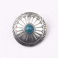 Detail of vintage zinc alloy button with turquoise bead and sunburst tribal engraving - Turquoise Green