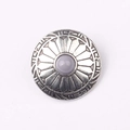 Detail of vintage zinc alloy button with engraved patterns and a grey gemstone center - Light Gray