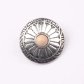 Macro detail of vintage zinc alloy button with pink resin stone and floral engraving - Flesh Pink