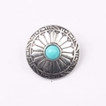 Macro detail of retro zinc alloy button with turquoise inlay and boho engraving - Turquoise