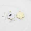 Detail of 18mm flower-shaped yin yang charms with gold plating and enamel inlay - White Flower