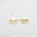 Detailed view of hollow ginkgo leaf alloy pendants with golden finish for DIY jewelry - Large