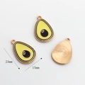 Detail of 23x15mm avocado alloy pendants showing enamel front and golden textured back - 23mmx15mm / Avocado