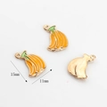 Detail view of 15mm banana-shaped enamel fruit charms for DIY jewelry making and crafts - 15mm x 11mm / Banana