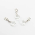Detailed view of three crystal star pendants with silver lobster clasps on white background - White