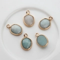 Colgantes de piedras ovaladas facetadas con bordes dorados para bisutería hecha a mano - Estilo Azul Claro Y Crema (05)