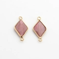 Macro view of pink natural stone rhombus charms with gold trim and dual connection rings - Rhodonite Color (08)