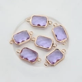 Detailed view of six lavender rectangular crystal connectors with gold plated copper borders - Crystal Purple