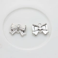 Colgantes de lazo de metal plateado brillante con textura para joyas artesanales - Plateado
